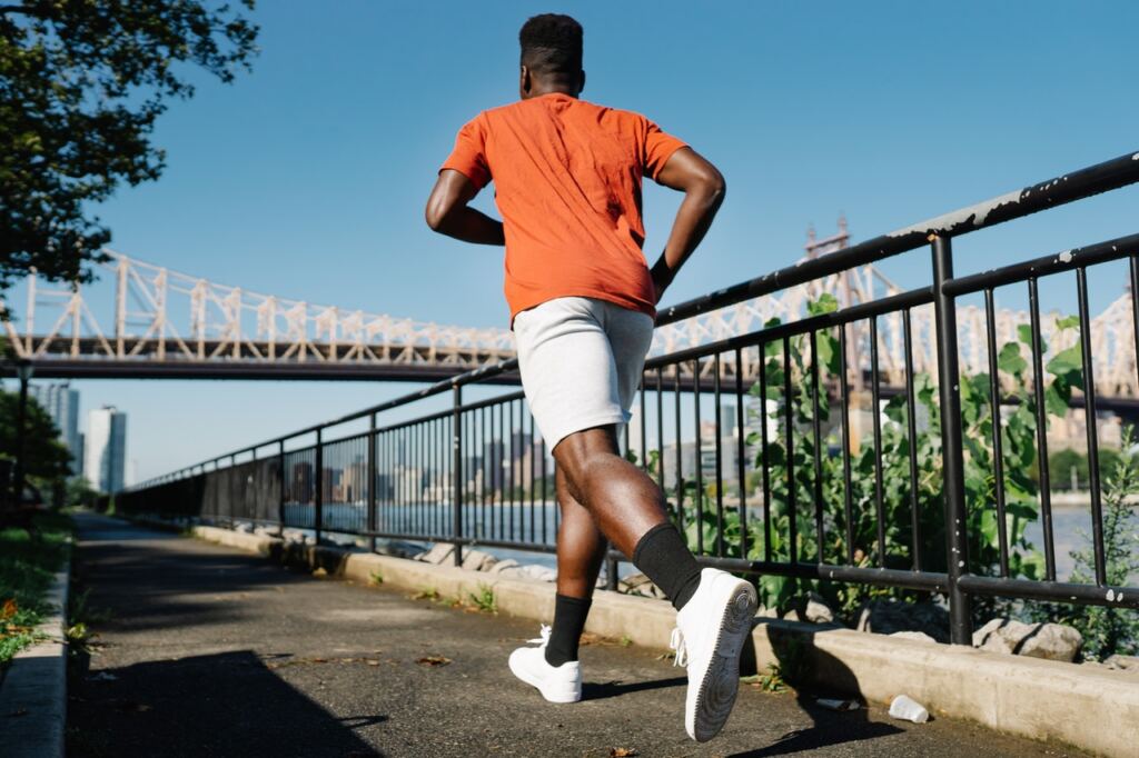 Benefits of regular exercise, featured image - a man running